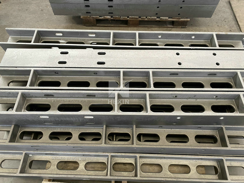 Alloy casting charge support for furnace