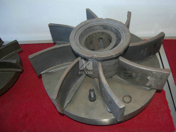 shot blast turbine with curved blades